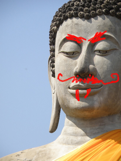 Defaced Buddha